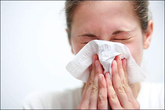 blowing nose in tissue