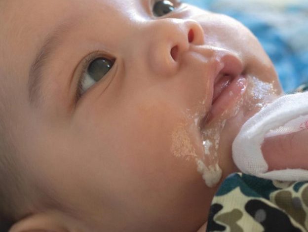 Baby Spitting Up Mucus Is It Normal Causes and When To Worry 624x702 1